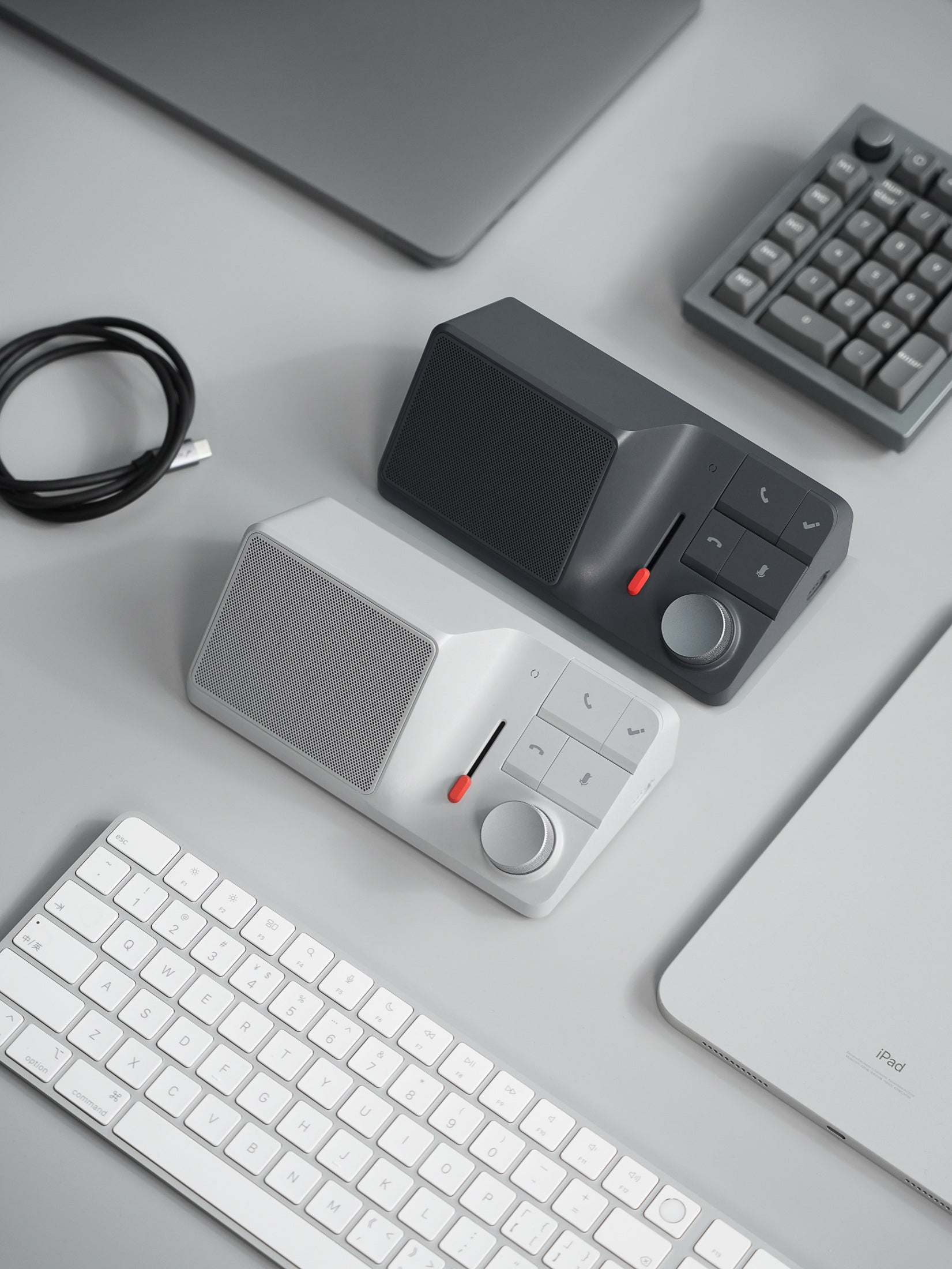HiDock H1 devices at two connected workspaces